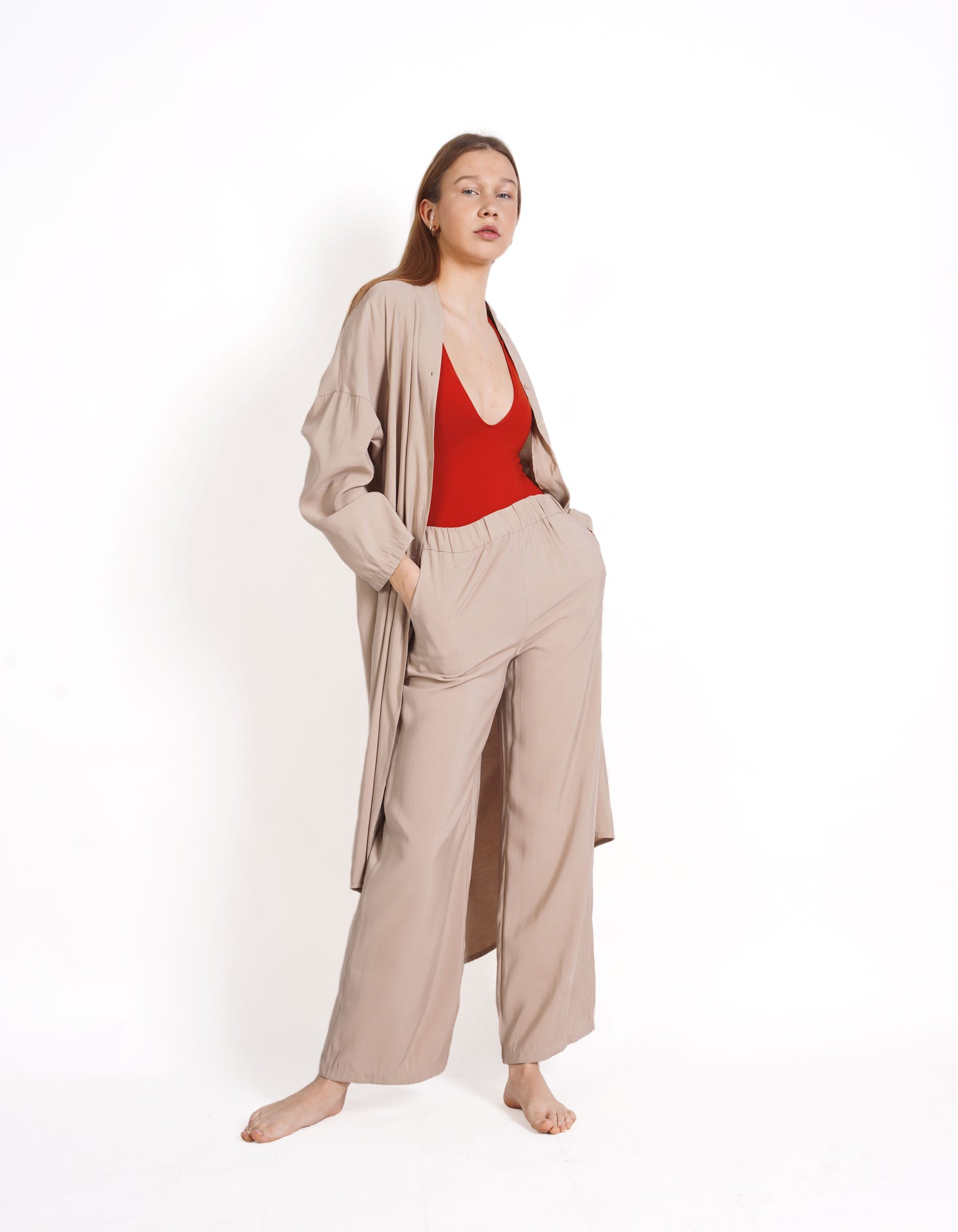 
                  
                    Straight-fit trousers with elasticated waistband
                  
                