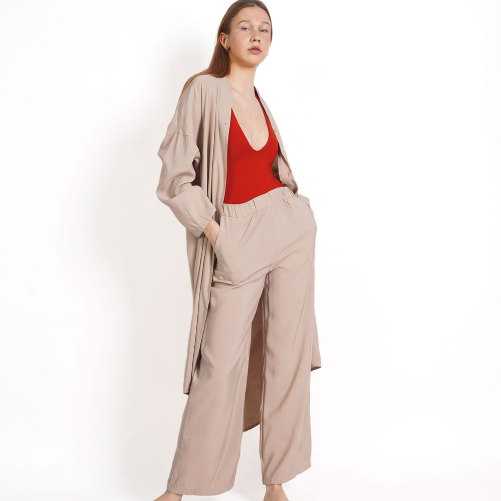 
                  
                    Straight-fit trousers with elasticated waistband
                  
                