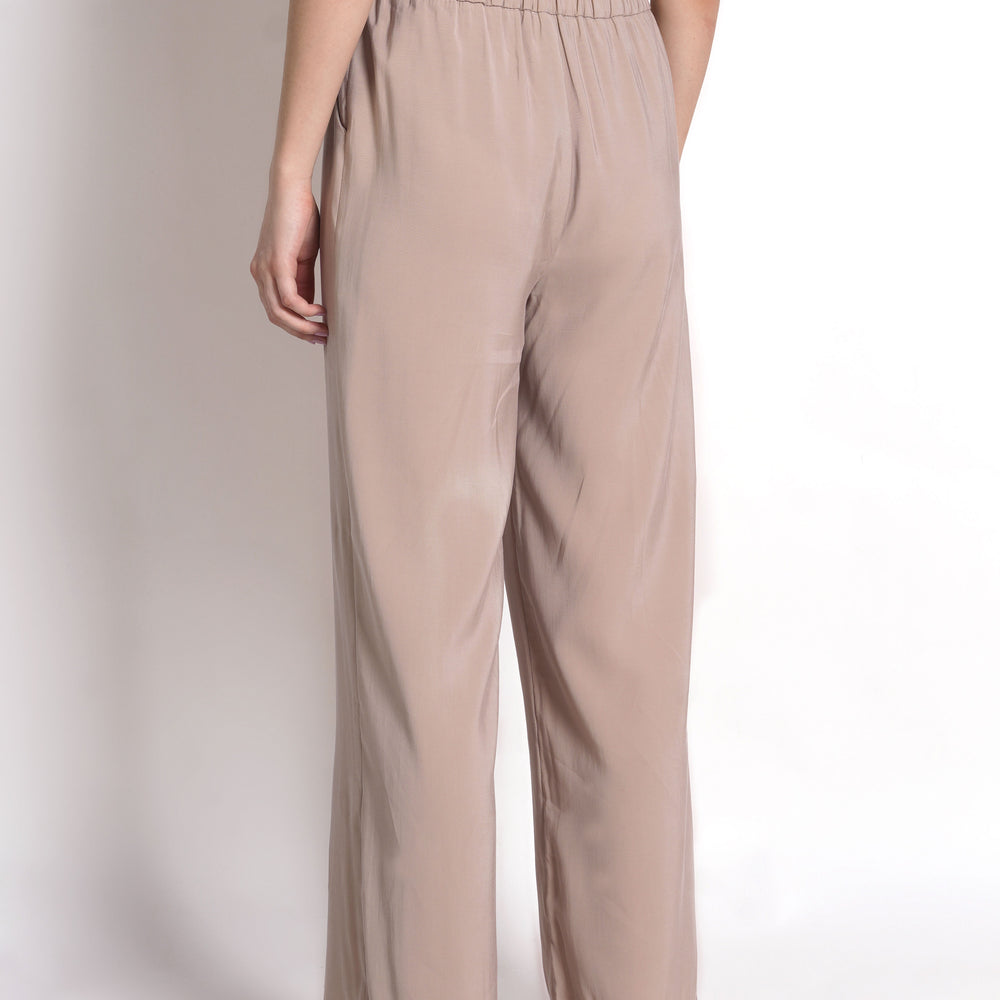 
                  
                    Straight-fit trousers with elasticated waistband
                  
                