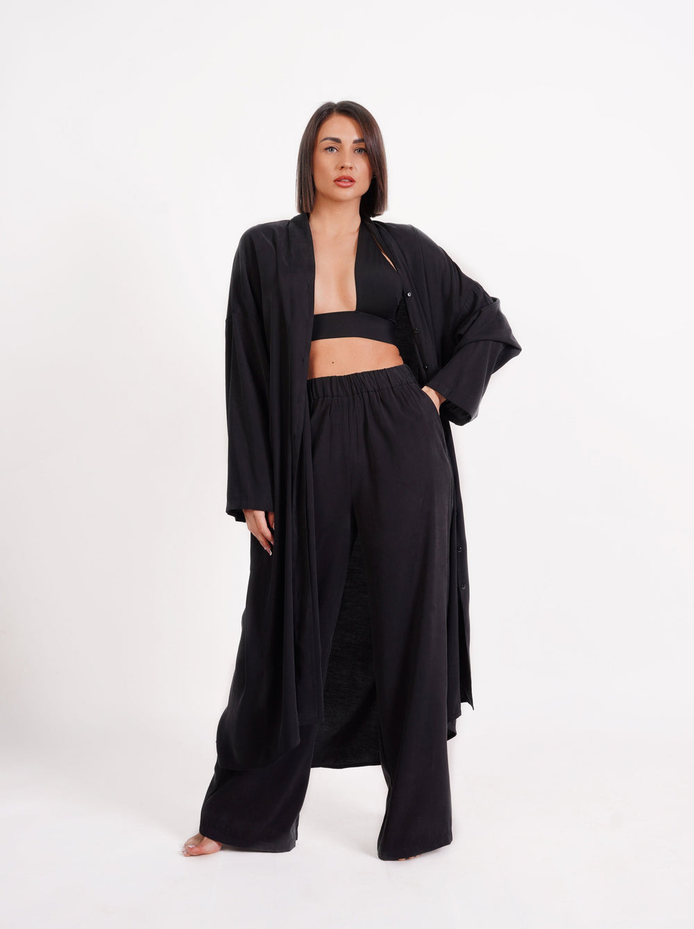 Blusa camisera maxi oversize con bolsillo