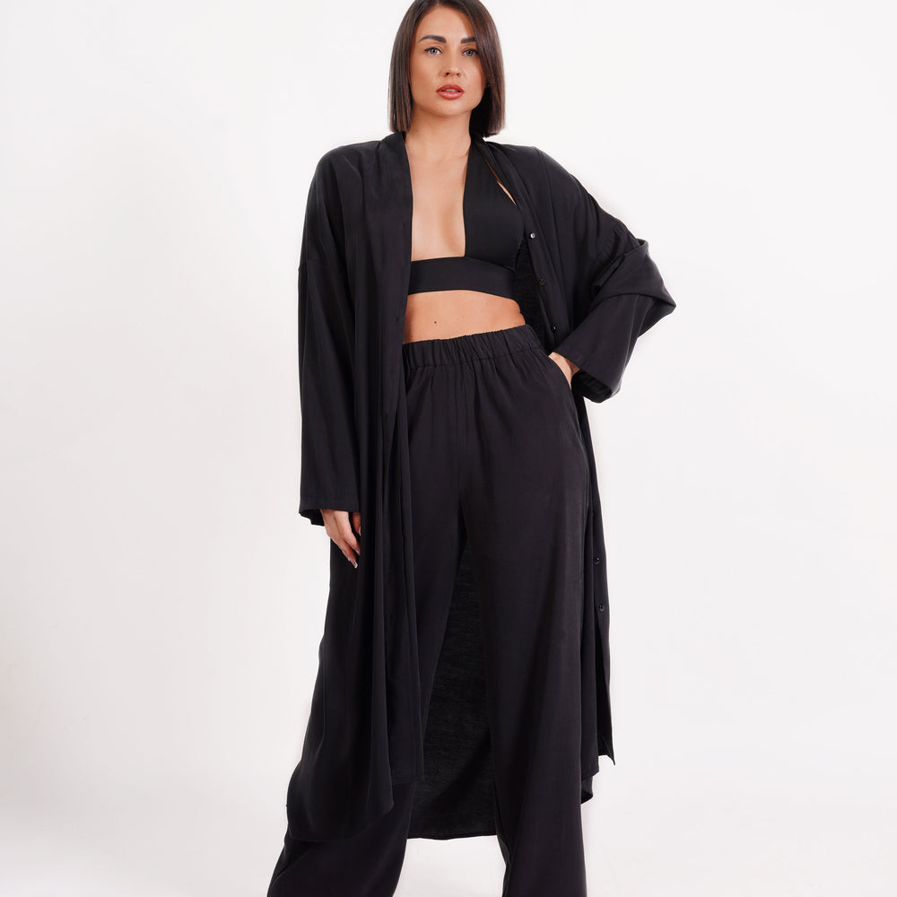 
                  
                    Blusa camisera maxi oversize con bolsillo
                  
                