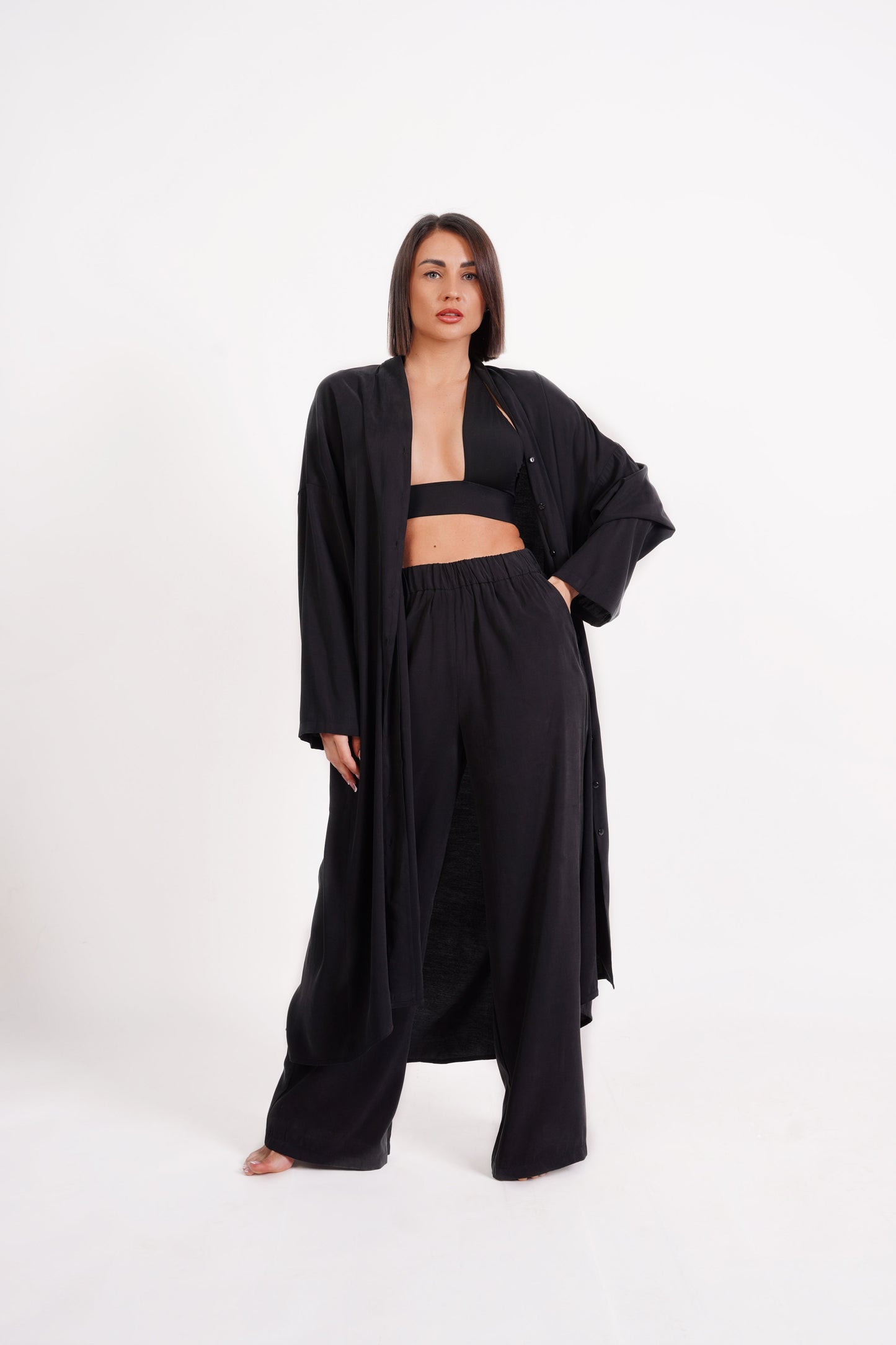 
                  
                    Blusa camisera maxi oversize con bolsillo
                  
                